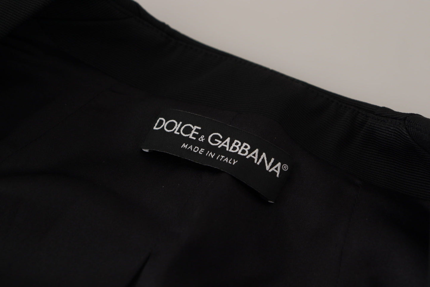 Dolce & Gabbana Sleek Black Snap Jacket with Silk Lining